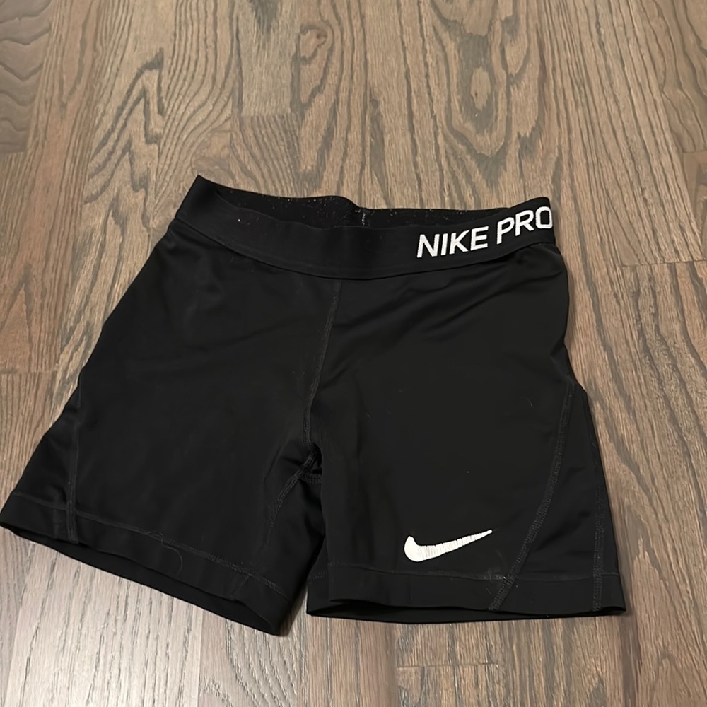 Kids large Nike pros.